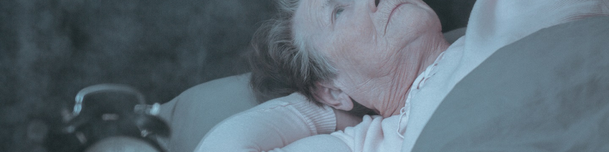 Older lady worried in bed